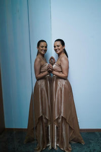 Elegant Beige Gown in Satin with Asymmetric Skirt and Sculpted Draping