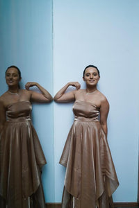 Elegant Beige Gown in Satin with Asymmetric Skirt and Sculpted Draping
