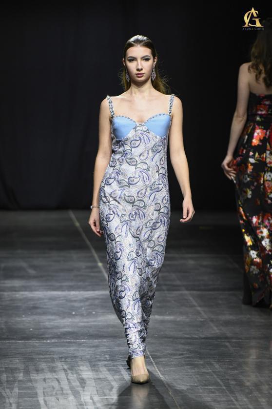 Elegant Blue and White Floral Dress with Playful Ruffle and Flattering Fit
