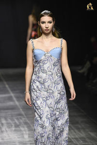Elegant Blue and White Floral Dress with Playful Ruffle and Flattering Fit