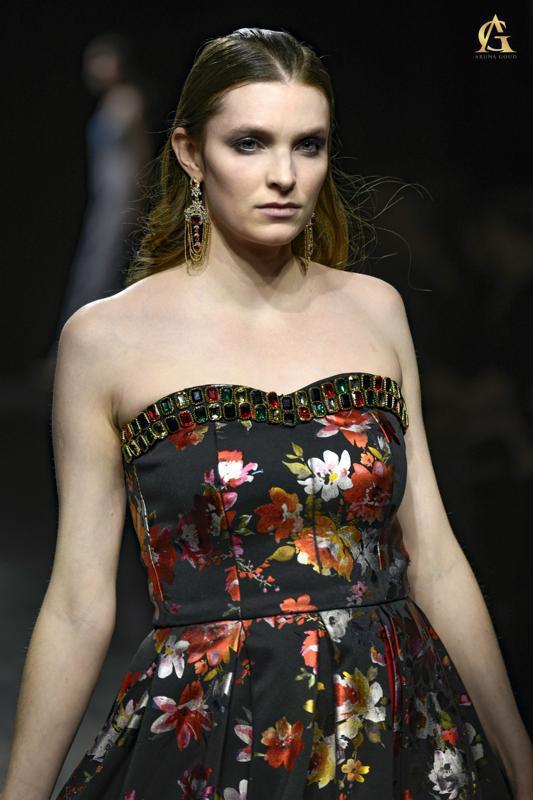 Elegant Black Strapless Dress Featuring Bold Floral Patterns and Flared Skirt