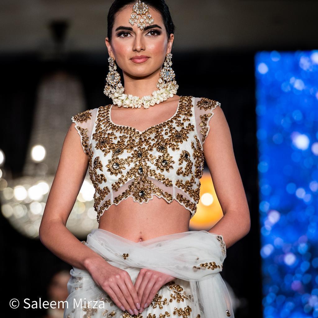 Luxurious White Lehenga with Golden Embroidered Blouse and Skirt