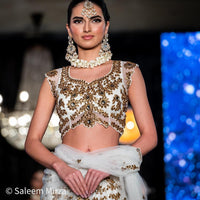 Luxurious White Lehenga with Golden Embroidered Blouse and Skirt