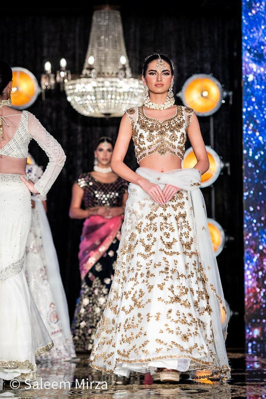 Luxurious White Lehenga with Golden Embroidered Blouse and Skirt